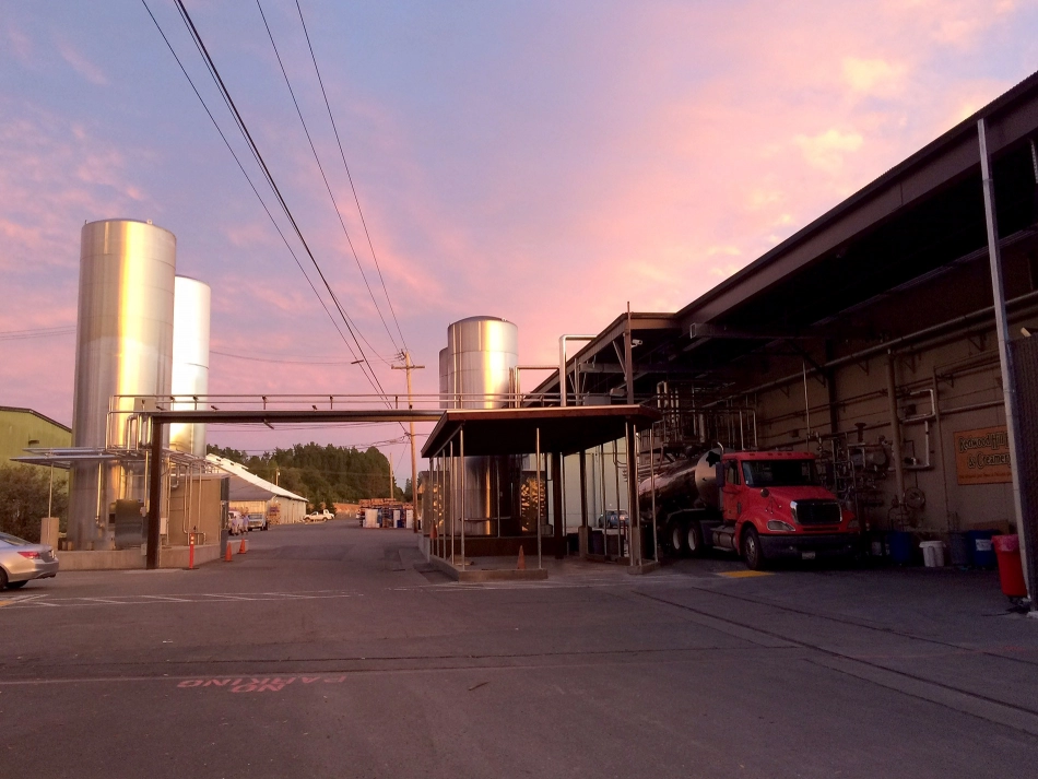 sunset behind a creamery